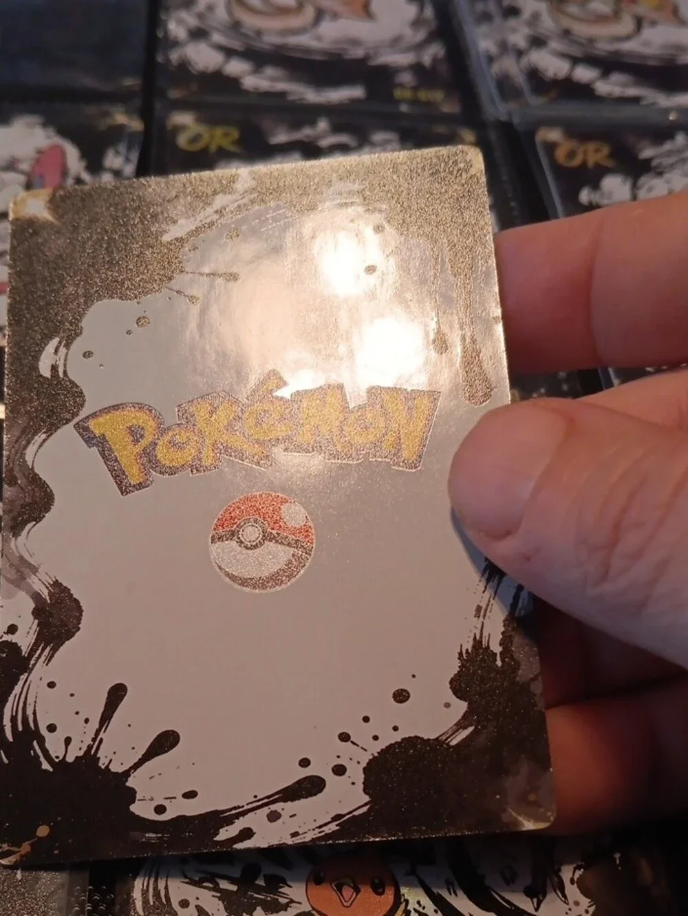 Pokemon OR Holo Card Featuring Black and Orange Accents
